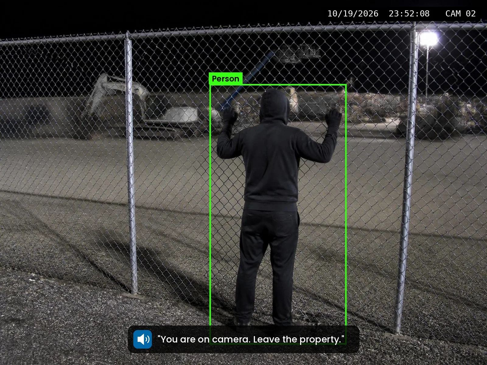 Owen Smart Video camera view of a trespasser at a perimeter fence, flagged in a green box